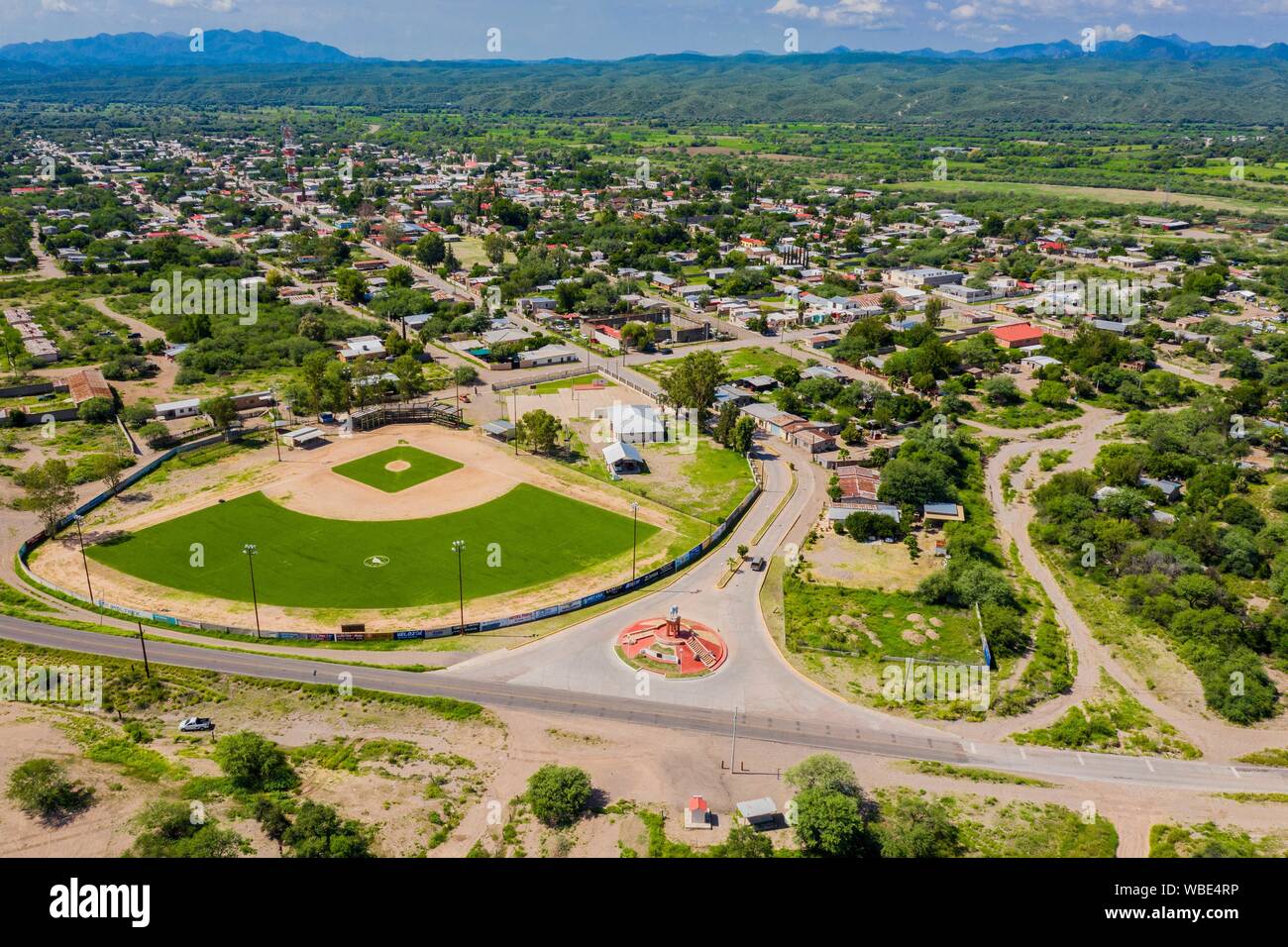 Aerial view of the statue or monument of the famous horse, El Moro de Cumpas and baseball stadium at the entrance of the town of Cumpas, Sonora, Mexico. Route of the Sierra in Sonora Mexico. located in the lower region of the Sierra Madre Occidente. It was founded in 1643 by the Jesuit missionary Egidio Monteffio under the name of Our Lady of the Assumption of Cumpas, with the purpose of evangelizing the Opal tribes that inhabited that place in the previous times and during the conquest.  (© Photo: LuisGutierrez / NortePhoto.com)  Vista aerea de la estatua o monumento del famoso caballo , El M Stock Photo