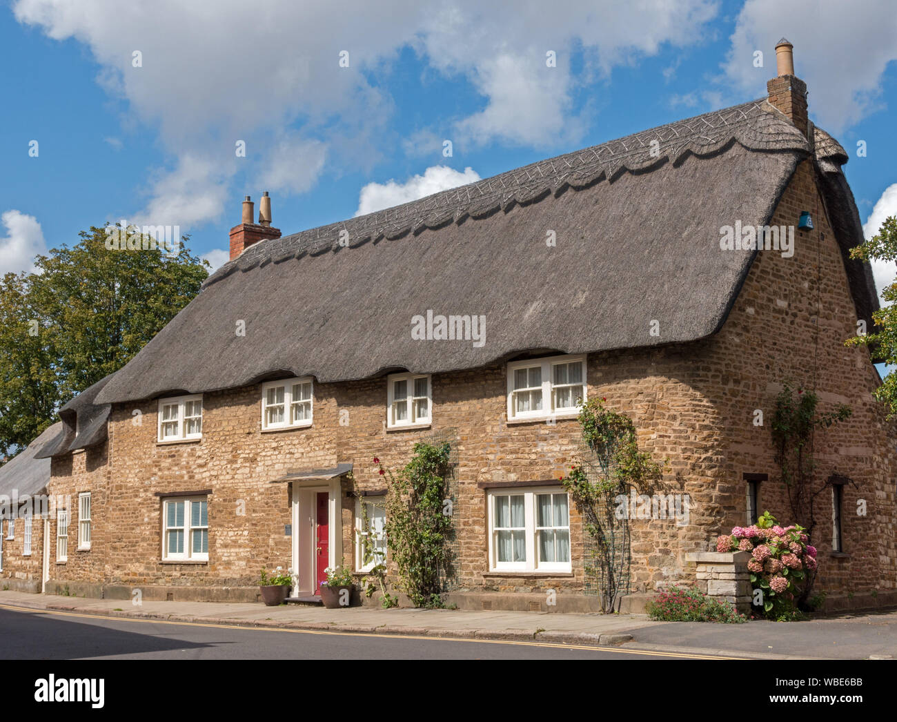 The Old Manor House English thatched stone cottage, Northgate Street, Oakham, Rutland, England, UK Stock Photo
