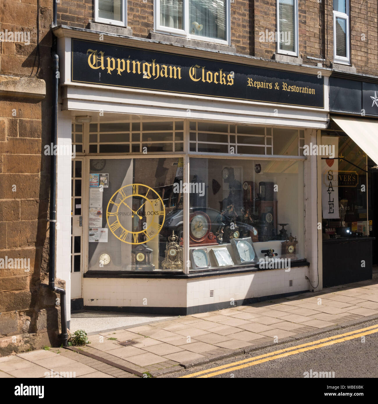 "Uppingham Clocks" clock shop front, Uppingham, England, UK Stock Photo