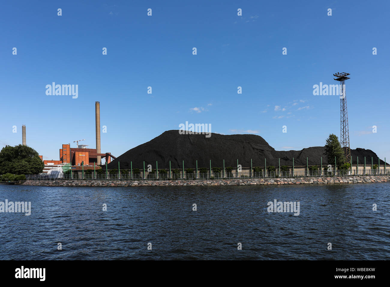 Hanasaari Power Plant coal pile viewed from Merihaka in Helsinki, Finland Stock Photo