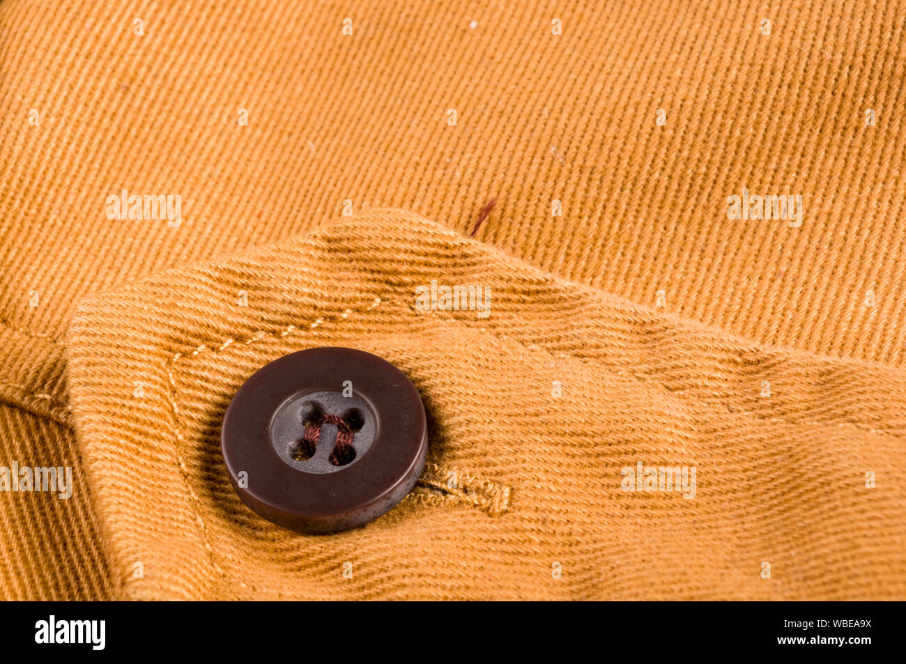 clothing items washed cotton fabric texture with seams, clasps, buttons ...