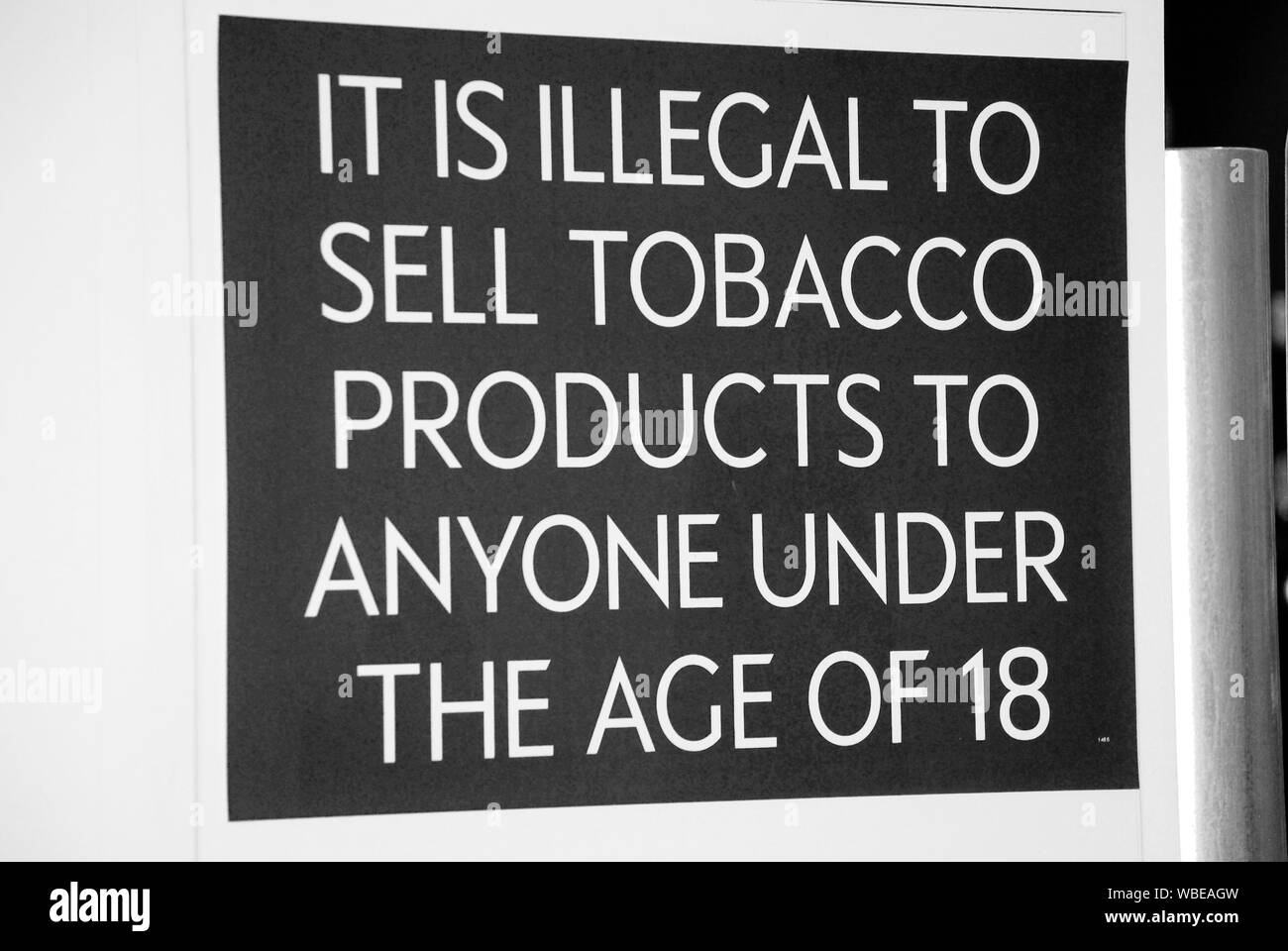 uk tobacco age A tobacco products age restriction sign in a store in the UK Stock Photo