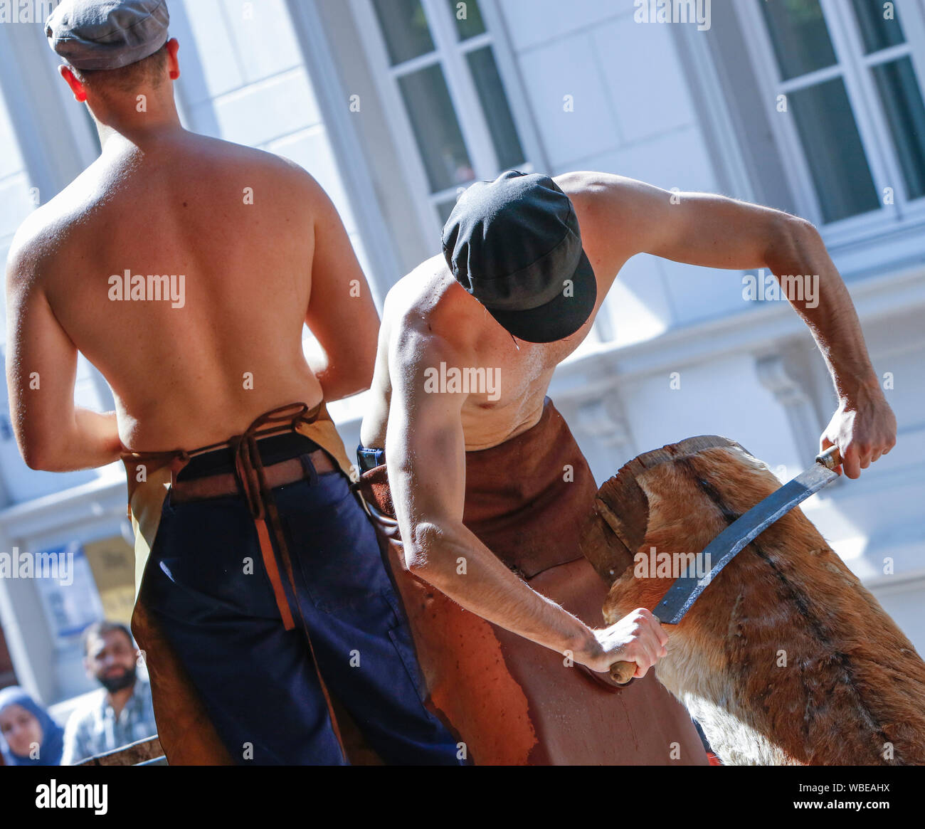 Worms, Germany. 25th August 2019. Local students perform the dance of the leather workers in the parade. The first highlight of the 2019 Backfischfest was the big parade through the city of Worms with over 70 groups and floats. Community groups, music groups and businesses from Worms and further afield took part. Stock Photo