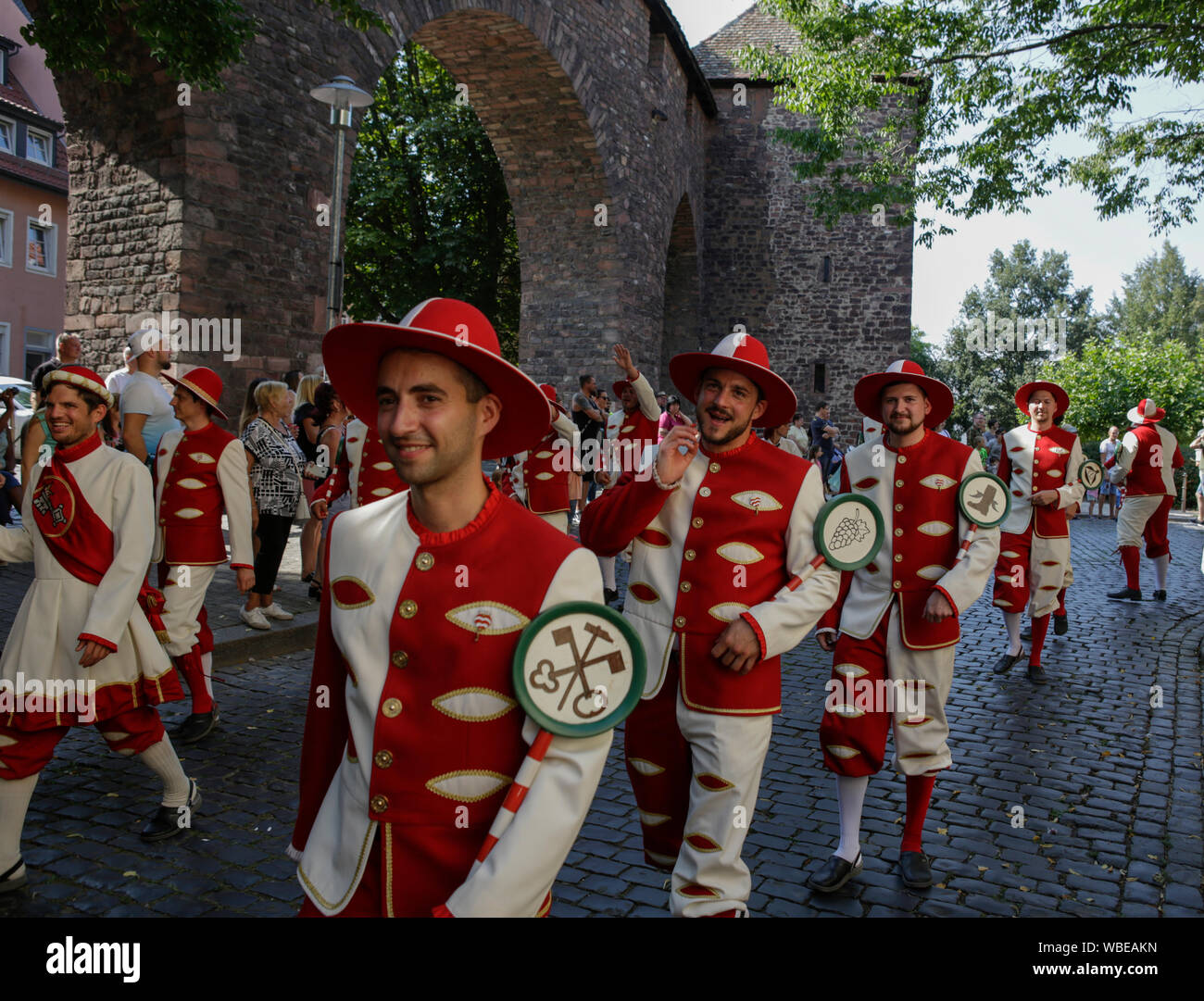 Worms, Germany. 25th August 2019. Journeymen march in the parade in traditional costume. The first highlight of the 2019 Backfischfest was the big parade through the city of Worms with over 70 groups and floats. Community groups, music groups and businesses from Worms and further afield took part. Stock Photo