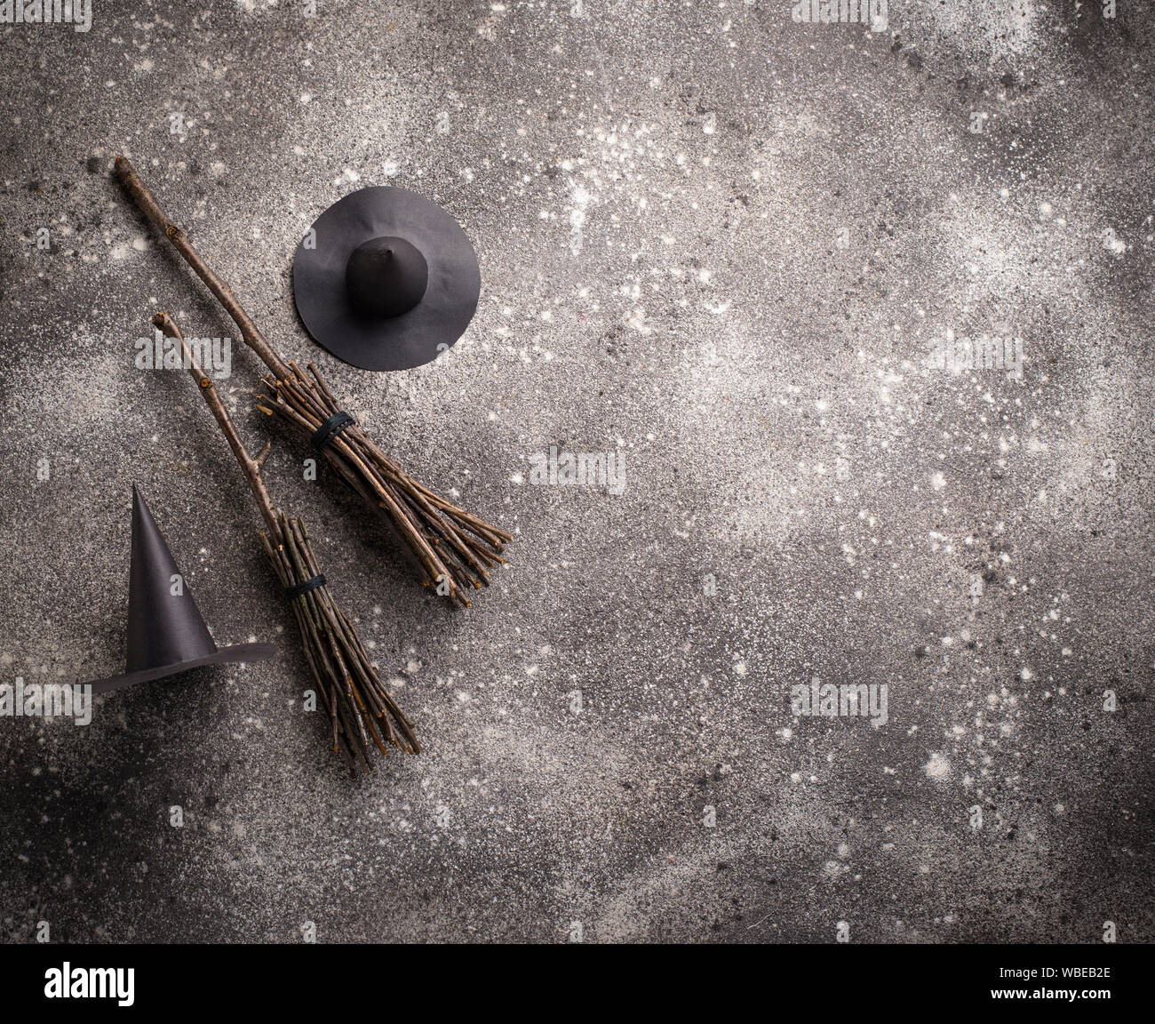 Halloween background with witches broom Stock Photo - Alamy