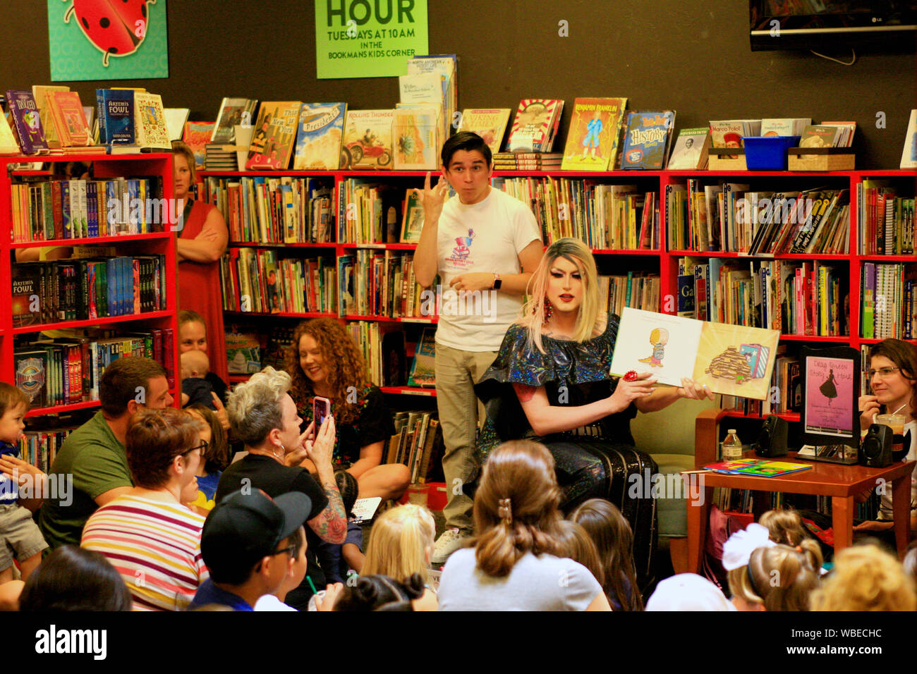Drag Queen reading to a group of children at a