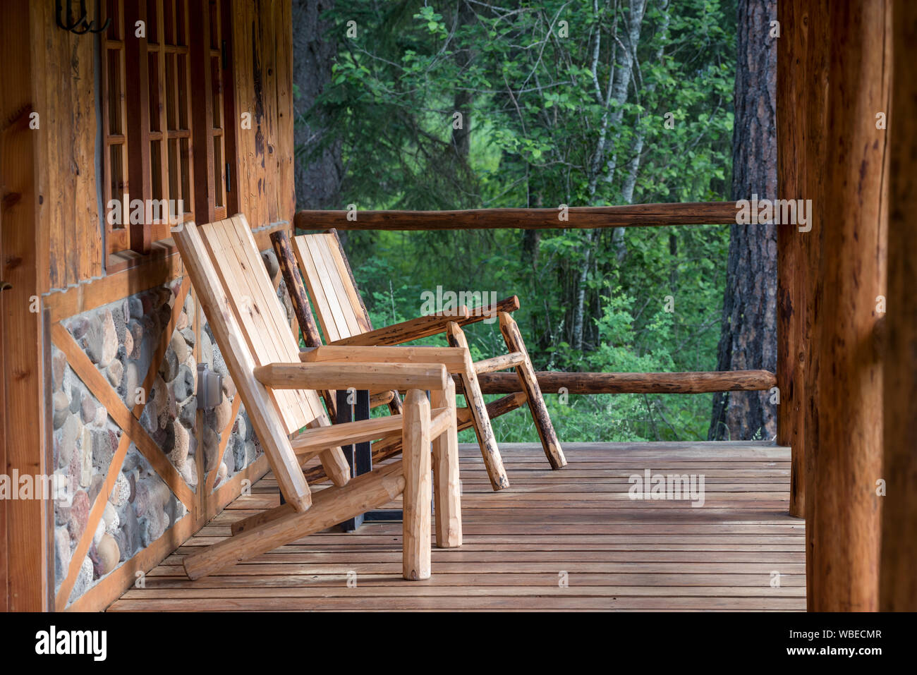 Chairs on the porch of a cabin at the Minam River Lodge in Oregon's ...