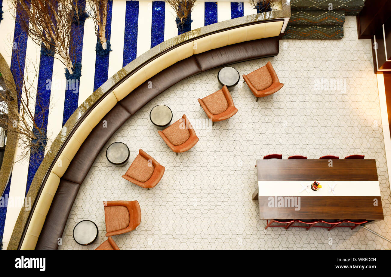 Top view of lounge with chairs couch and plants Stock Photo Alamy