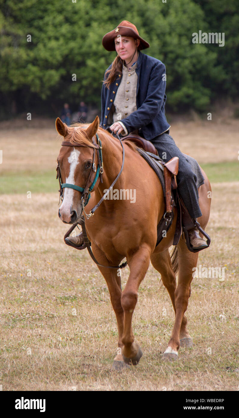 Woman in Union uniform on horseback during Civil War Reenactment at Duncan Mills on July 14