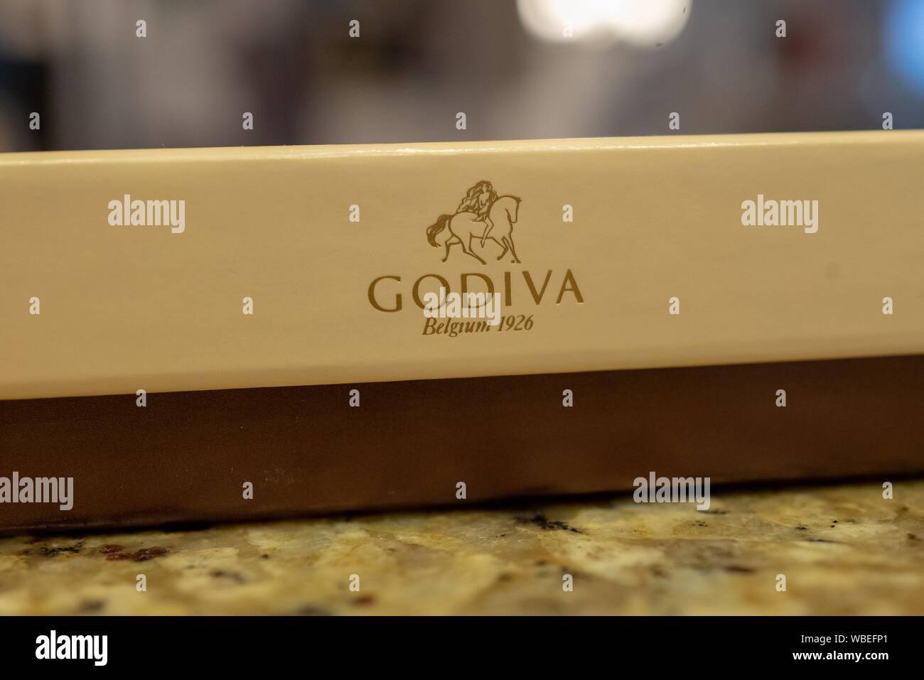 Closeup of logo for chocolate company Godiva Chocolates on a box of
