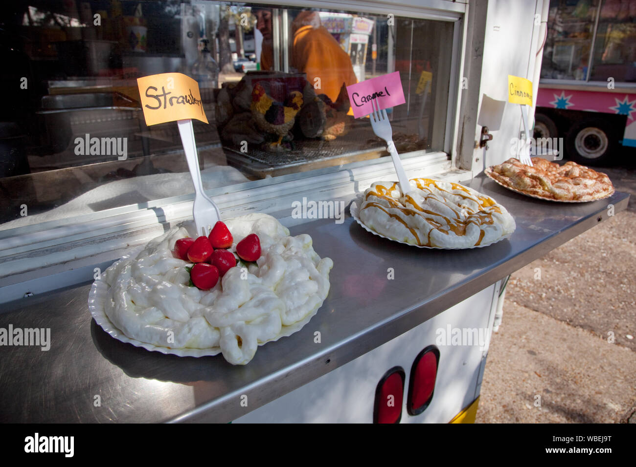 Funnel cakes are available in many flavors at the Mardi Gras celebration in Mobile, Alabama