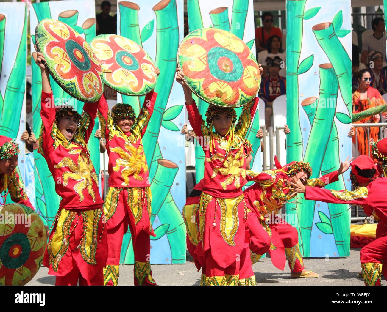 Davao City, PhilippinesAugust 2014 Street dancers in colorful costumes and props perform a