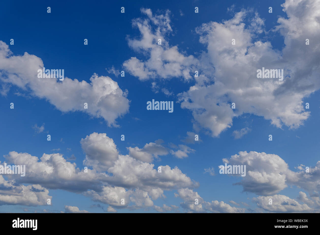 Beautiful sunny view of deep blue sky and Altocumulus cloud. Stock Photo