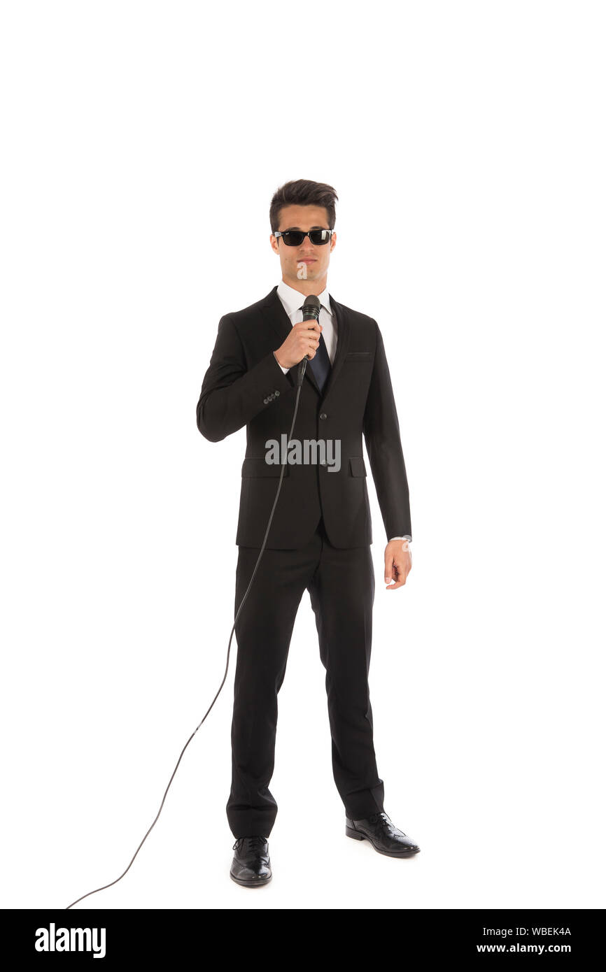 Studio portrait of a young man in a classic elegant suit; background is white Stock Photo