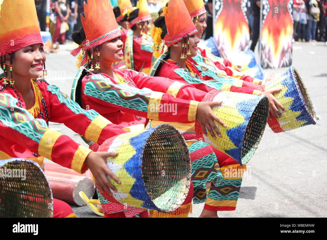 Davao City, PhilippinesAugust 2014 Street dancers in colorful costumes and props during a