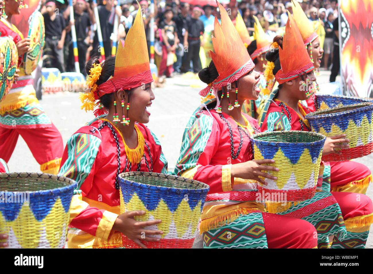 Davao City, PhilippinesAugust 2014 Street dancers in colorful costumes and props at the parade