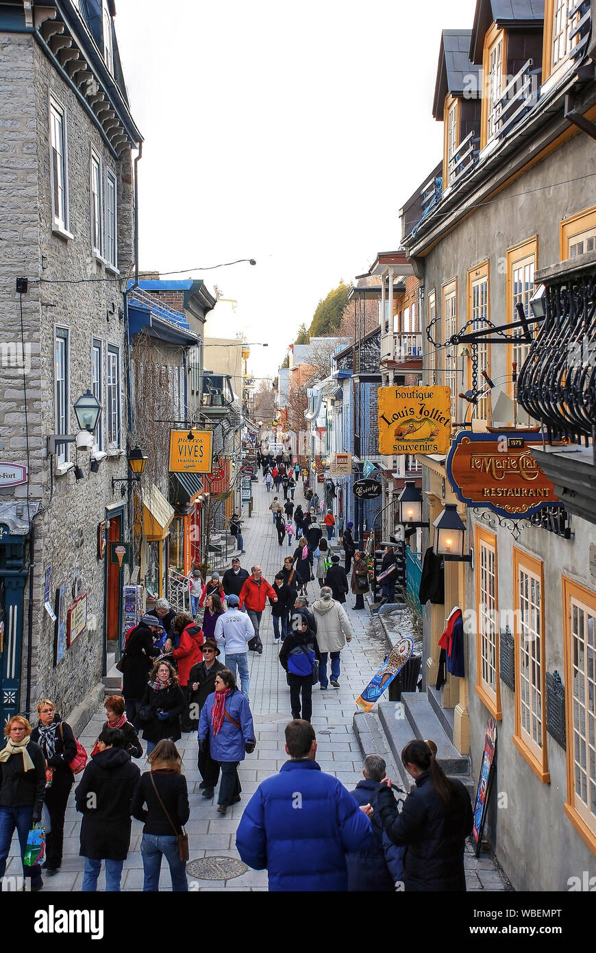 Quebec City, Canada - April, 10, 2009: A crowd of people on the busy Quartier du Petit Champlain in old Quebec City.  It is claimed to be the oldest c Stock Photo
