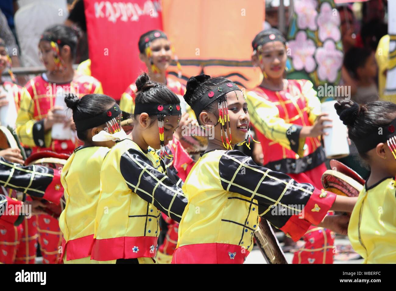 Davao City, Philippines-August 2014: The streetdancing competition at the Kadayawan festival attracts hundreds of thousands of visitors to Davao City Stock Photo