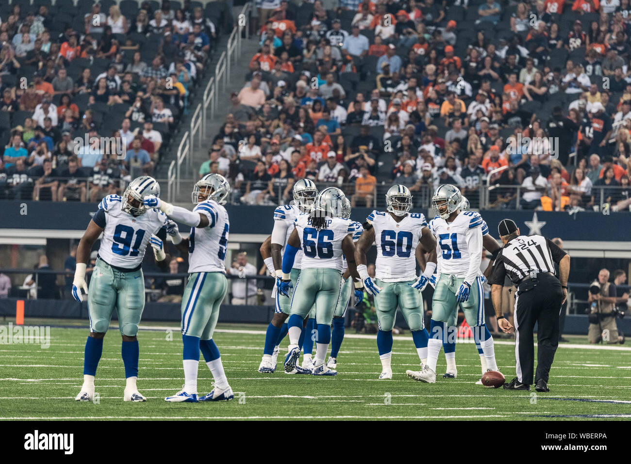 Game images from a contest between the National Football League Dallas