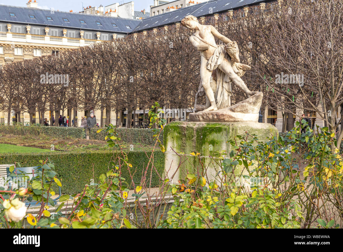 Paris, France - January 02, 2013: The gardens of the Royal Palace (Palais Royal) at Paris on a winter day Stock Photo