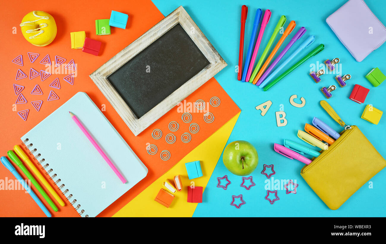 Back to school colorful kid's theme concept flat lay with blackboard ...
