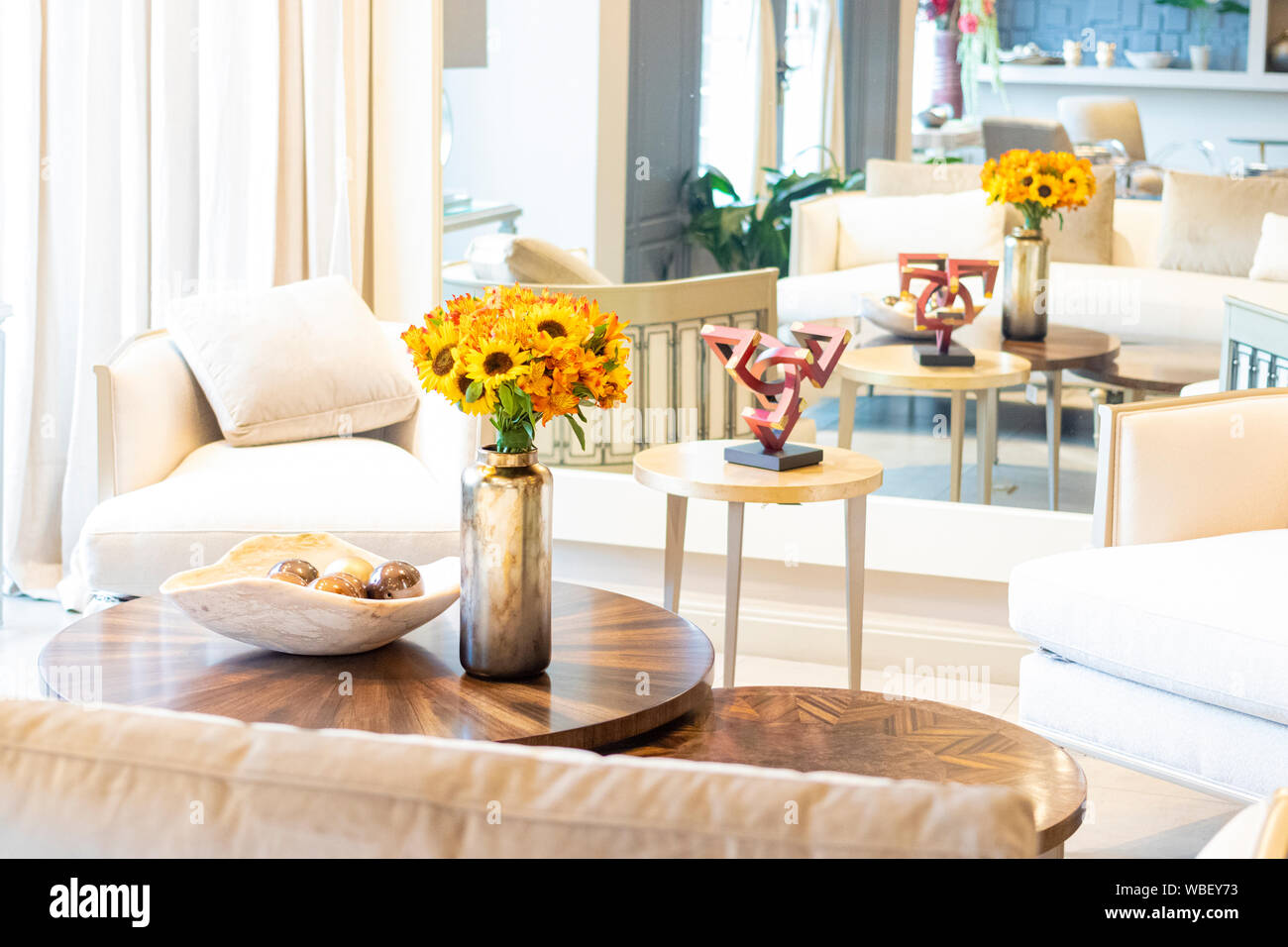 Floral Arrangement Of Sunflowers Decorating The Living Room Of The