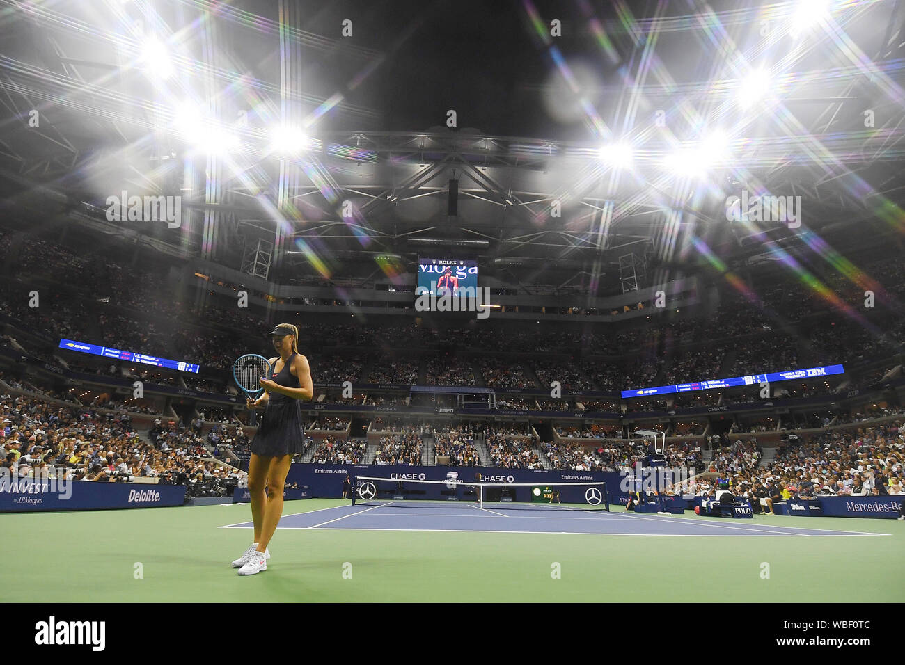 New York, USA. 27th Aug, 2019. New York, USA. 26th Aug, 2019. Flushing Meadows New York US Open Tennis 26/08/2019 Alone with her throughts, Maria Sharapova during facile defeat by Serena Williams (USA) 6-1, 6-1 victory over Maria Sharapova (RUS) under the lights of Arthur Ashe Stadium. Serena owns Sharapova 20-2 overall. Credit: Roger Parker/Alamy Live News Stock Photo