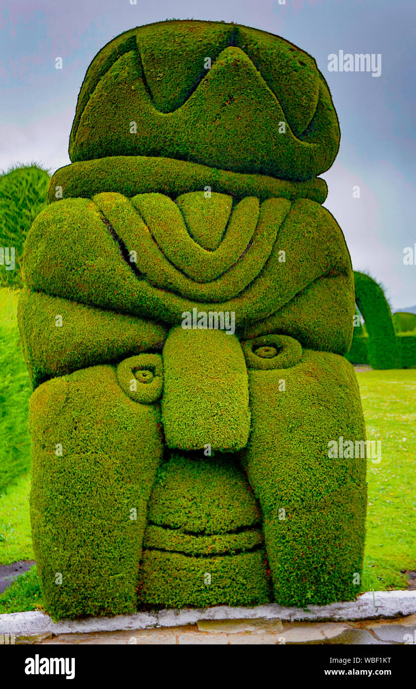 Tulum, Ecuador, Dec 11, 2017 - Exotic topiary created in Tulum cemetary in the North of Ecuador Stock Photo