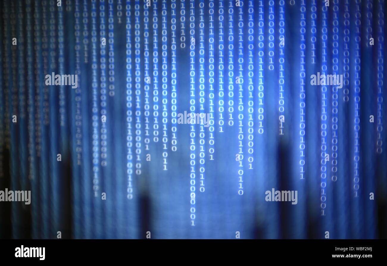 data bombardment. lines and lines of binary code falling from above. AI, IOT, data transfer hacker virus malware spyware and coding concepts. digital Stock Photo