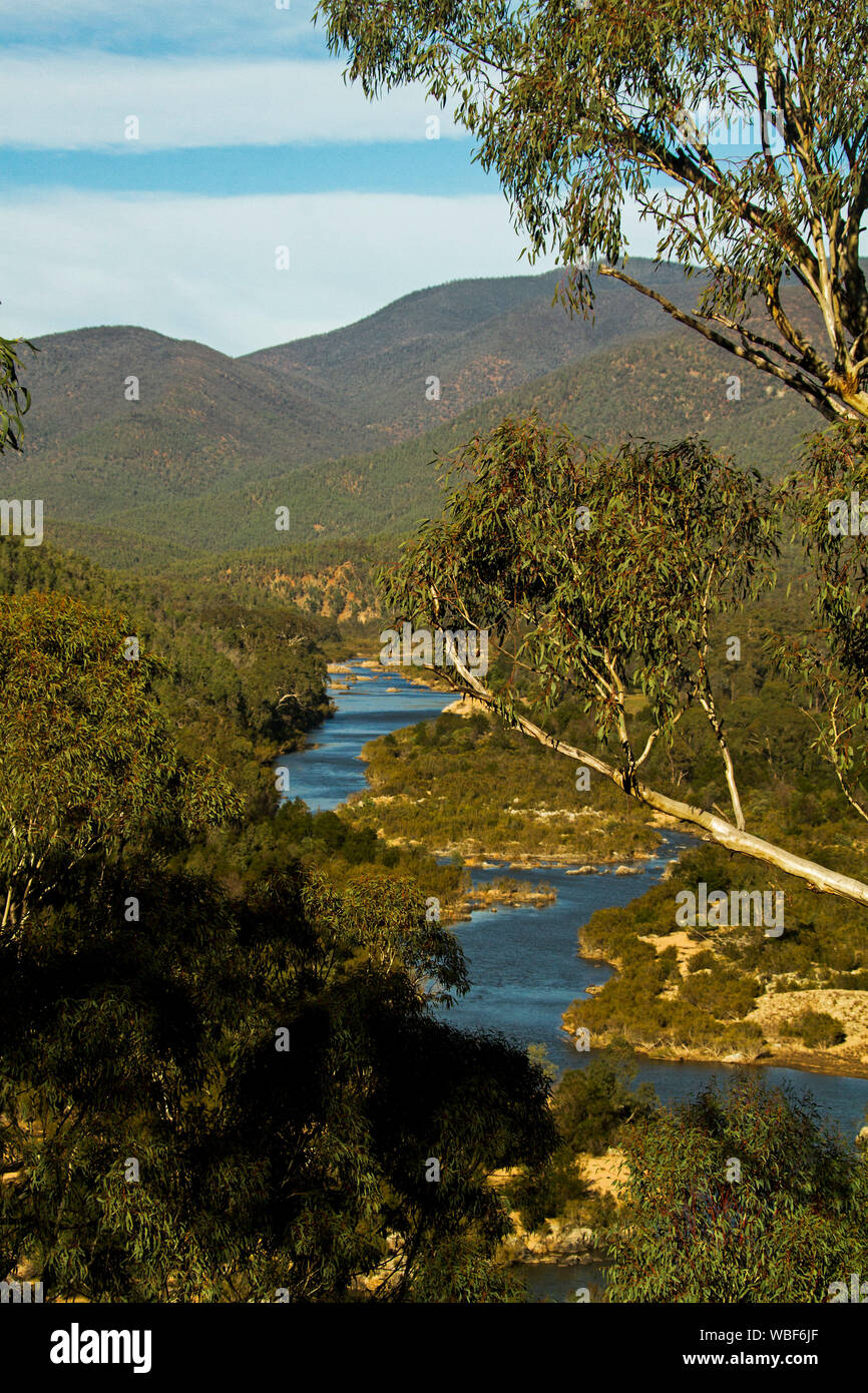 View of  forested ranges of Alpine National Park with blue waters of Snowy River in deep valley far below in Victoria Australia Stock Photo
