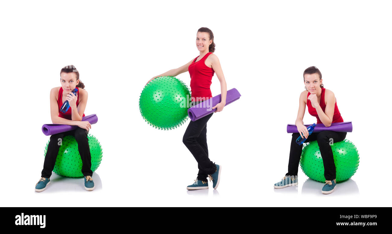 The young woman exercising with swiss ball Stock Photo - Alamy