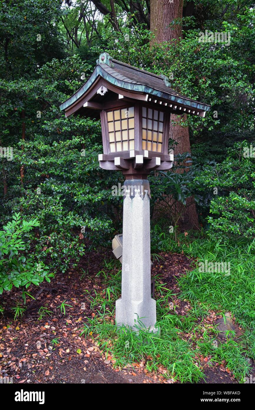 Traditional Japanese gardens in public parks Tokyo, Japan. Views of stone lanterns, ponds, bonsai wildlife walking around paths and trai Stock Photo - Alamy