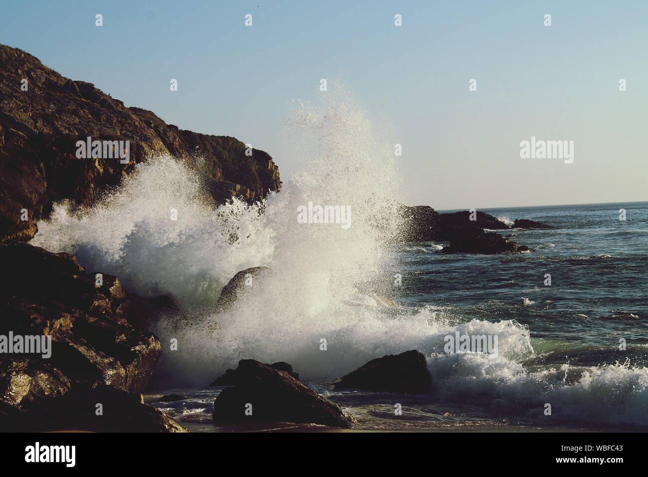 Waves crash against rock surf hi-res stock photography and images - Alamy