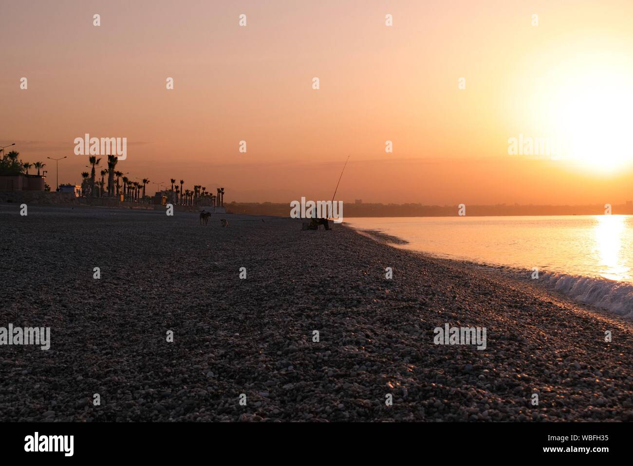 Fishing beach sunset hi-res stock photography and images - Alamy