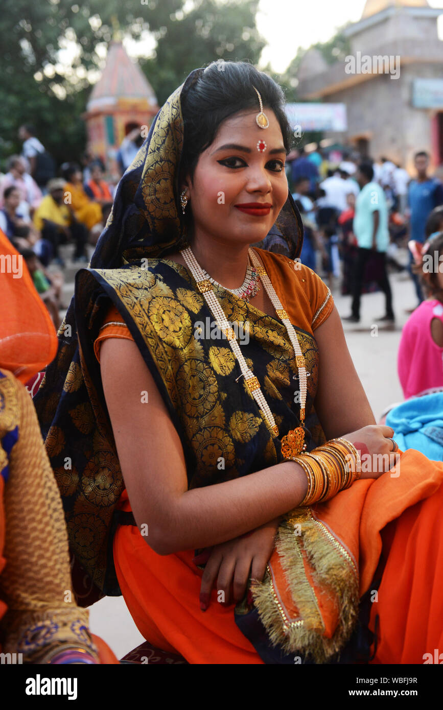 Indian dancers wearing traditional sari with the Seedha pallu drape . Stock Photo