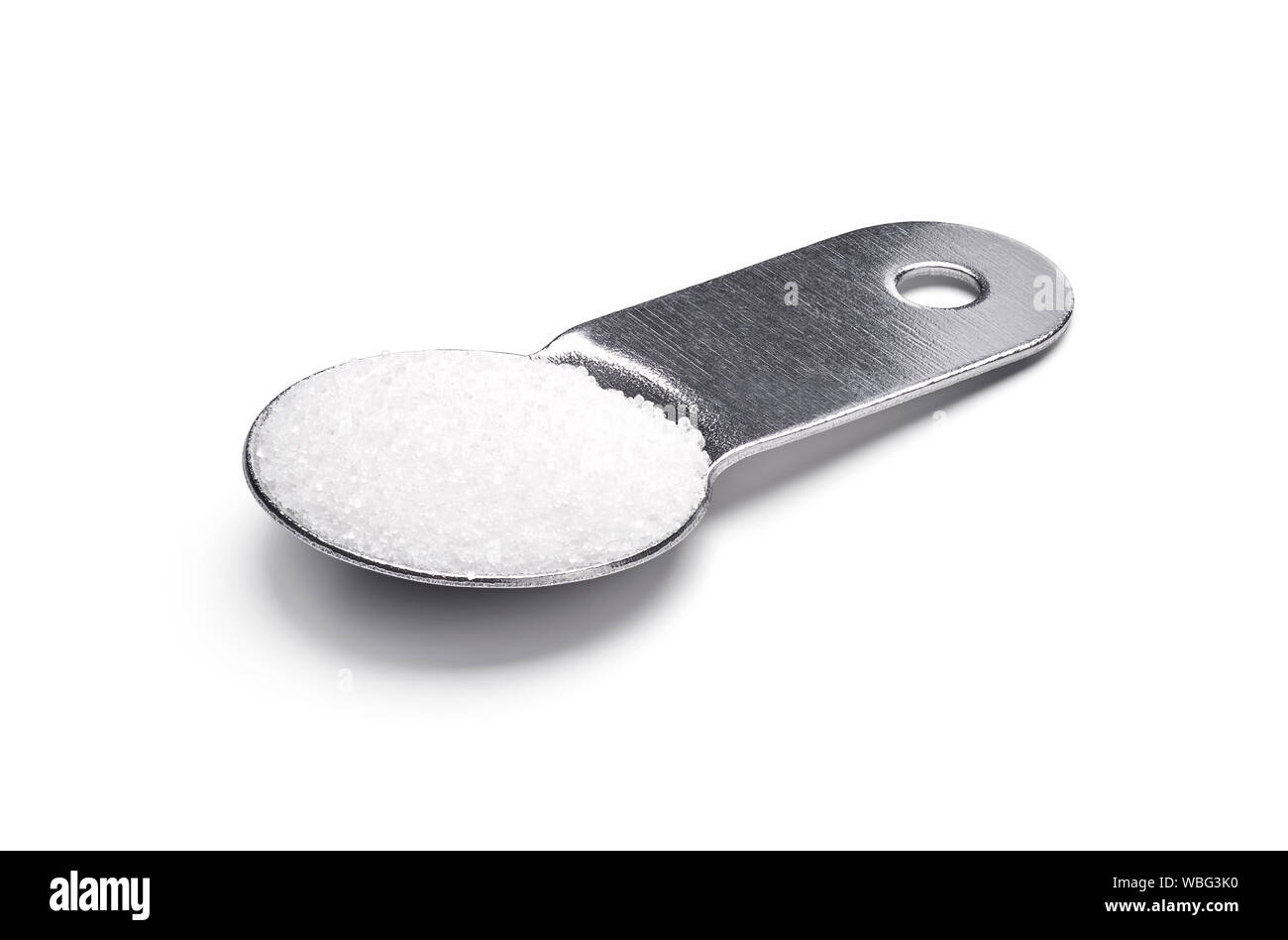 One tablespoon of sugar on white background - clipping path included Stock Photo