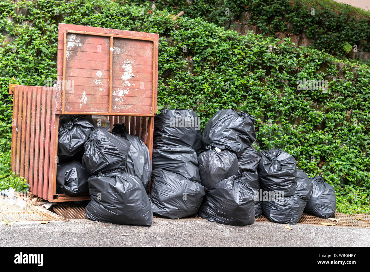 Stack black plastic dustbin bags hi-res stock photography and images - Alamy