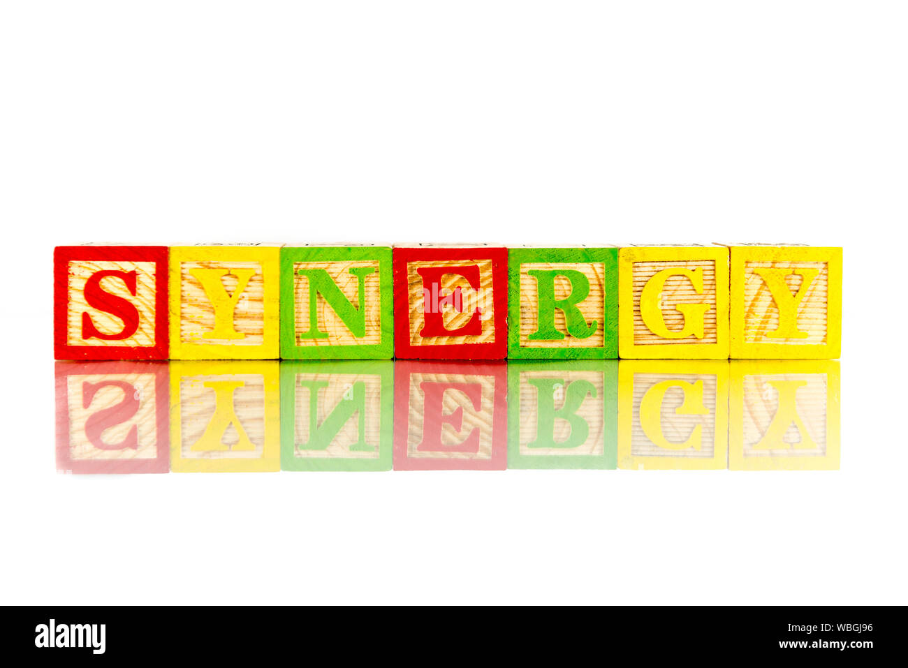 Colorful Synergy Toy Blocks Text Against White Background Stock Photo