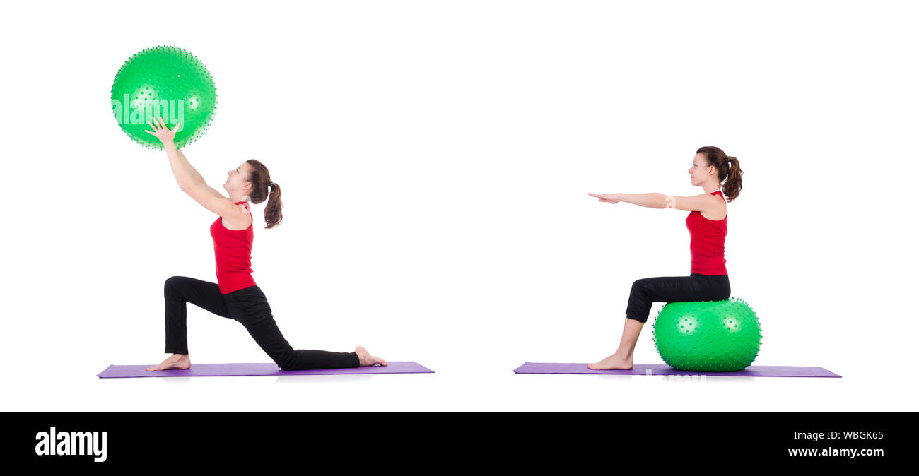 The young woman exercising with swiss ball Stock Photo - Alamy