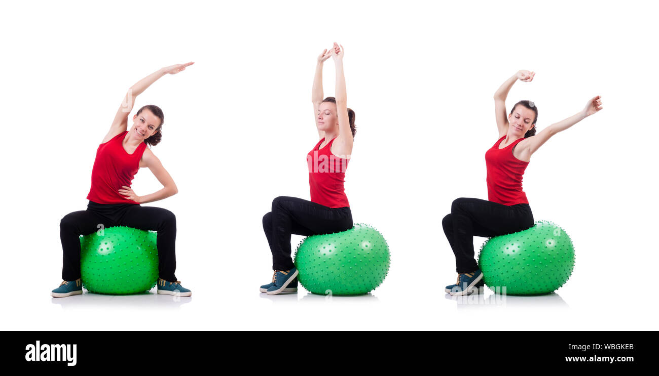 The young woman exercising with swiss ball Stock Photo - Alamy