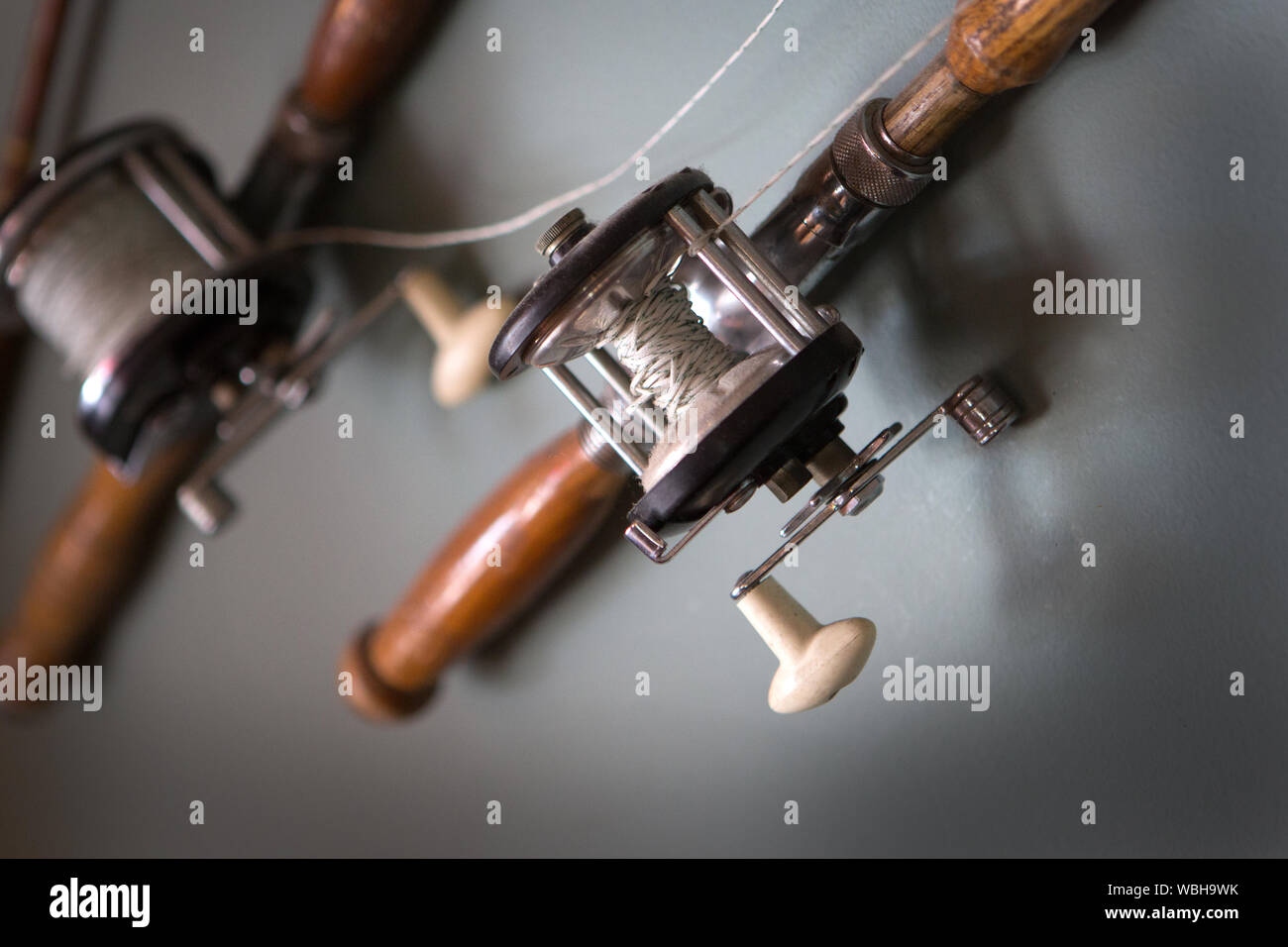 A display of old style fishing rods Stock Photo - Alamy
