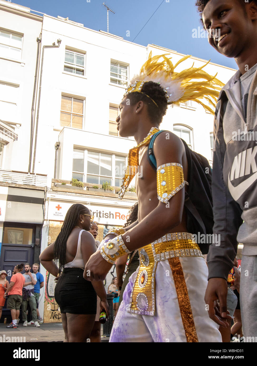 A male masquerader. Notting Hill Carnival 2019 continued on Bank Holiday Monday, with over a million revellers hitting the streets of West London, amongst floats, masqueraders, steel bands, and sound systems. Stock Photo