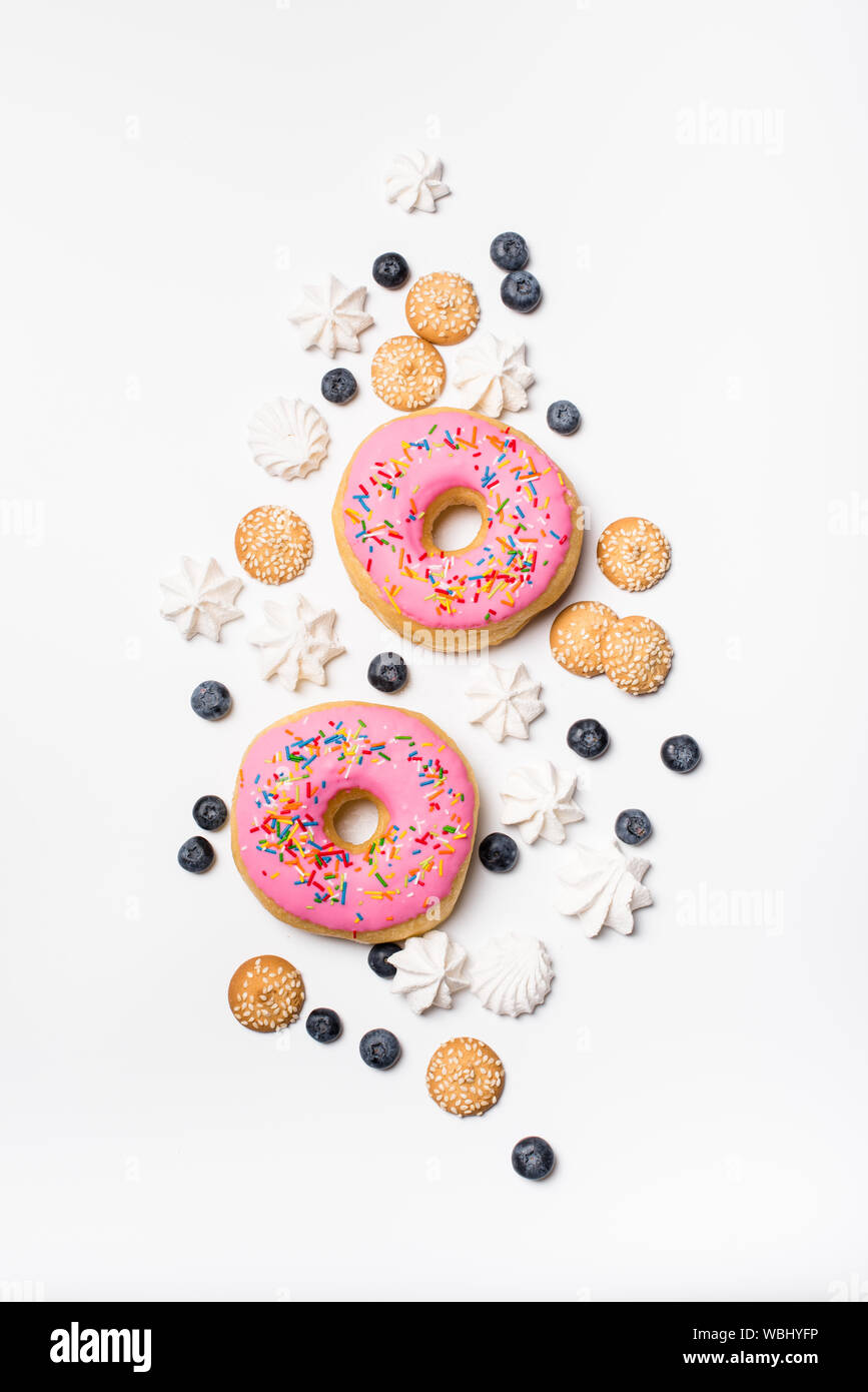Fresh sweet bonuts on white studio background Stock Photo
