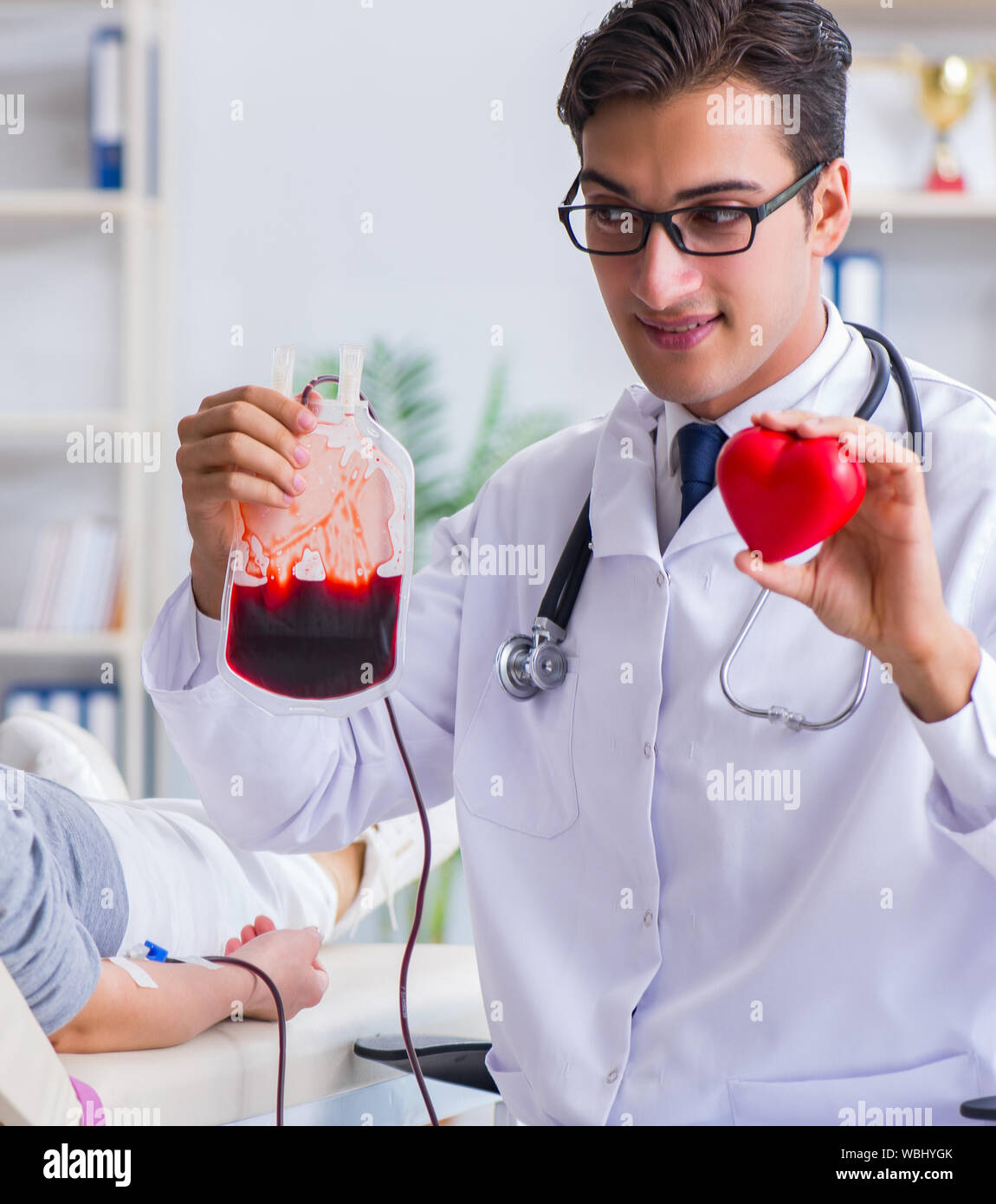 The patient getting blood transfusion in hospital clinic Stock Photo