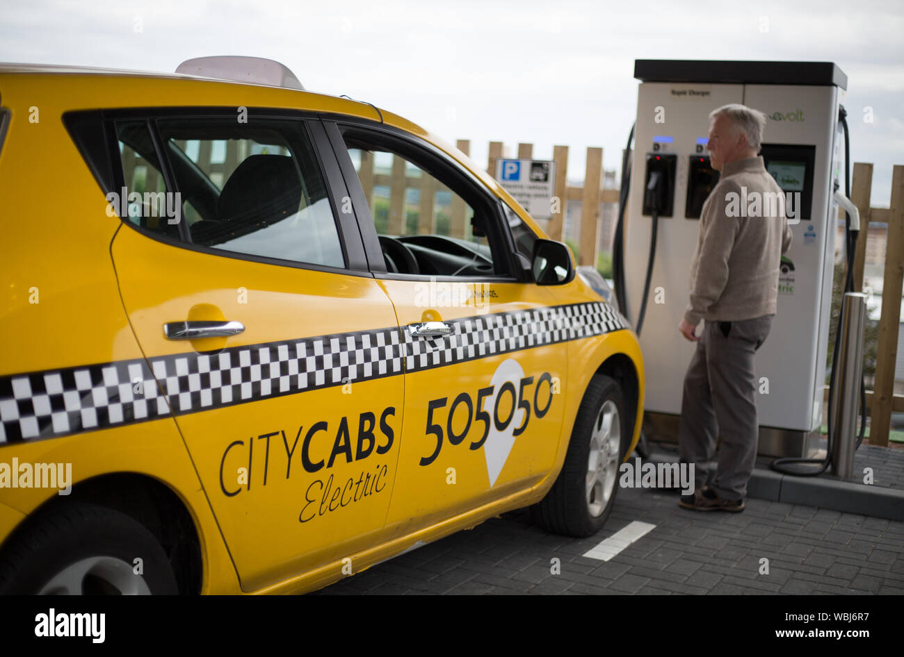 Electric vehicle charging point dundee hires stock photography and