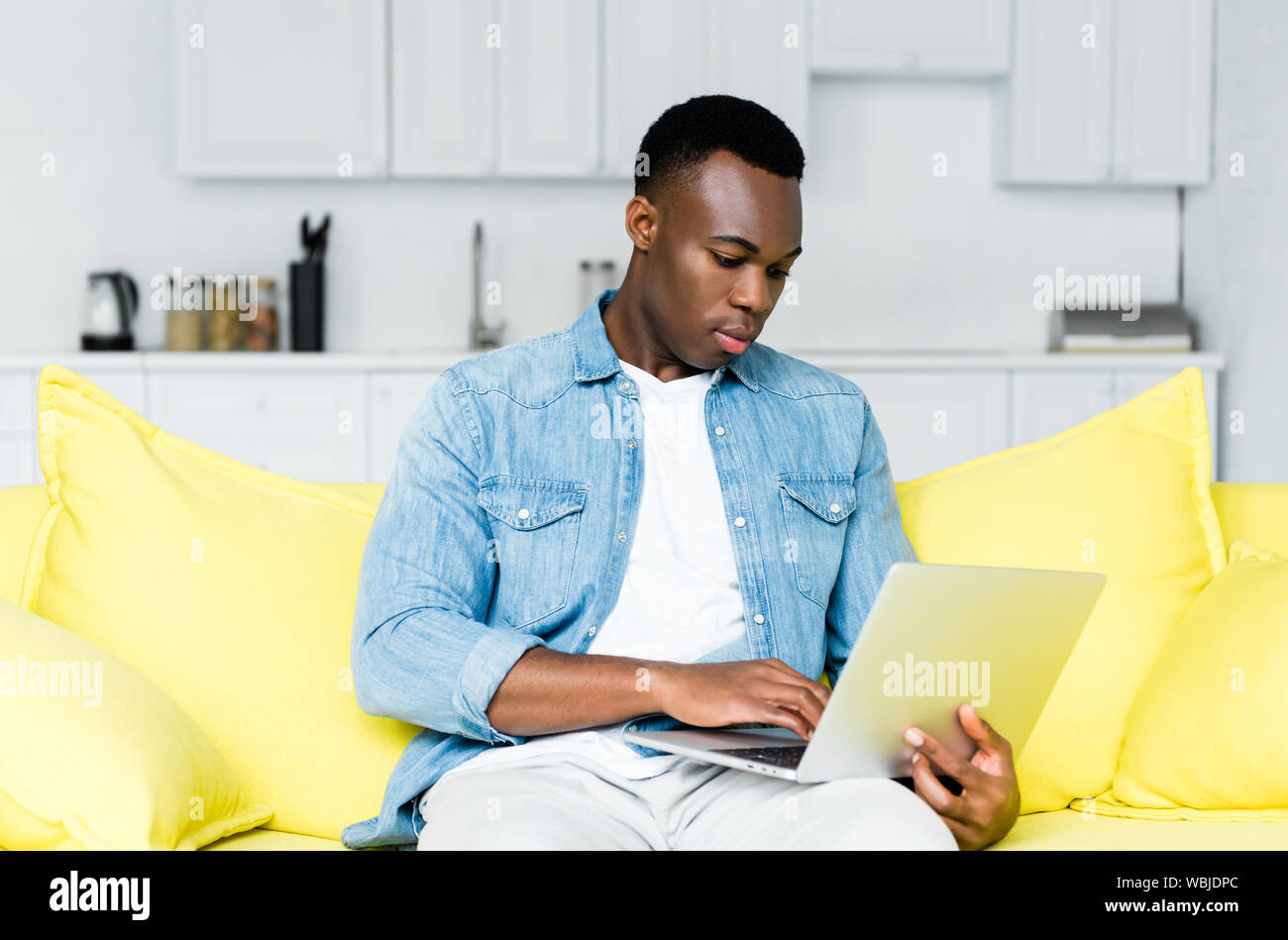 african american man using computer at home Stock Photo - Alamy