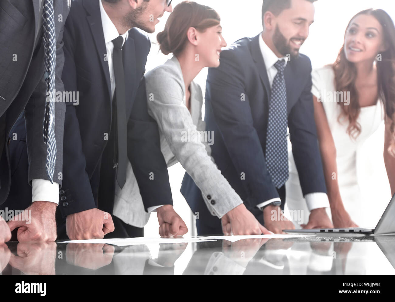 business team standing near the office Desk Stock Photo - Alamy