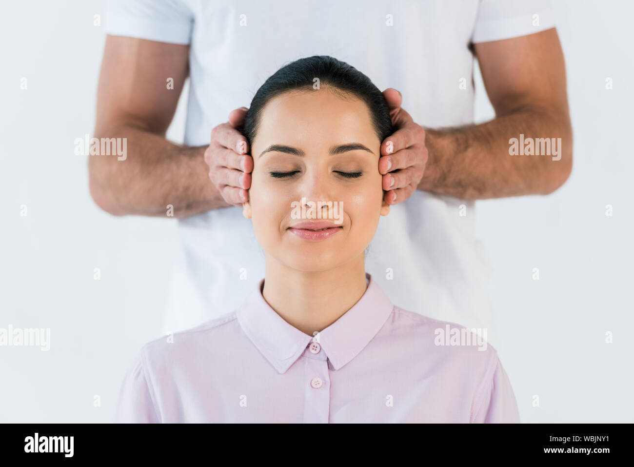 Hands on temples hi-res stock photography and images - Alamy