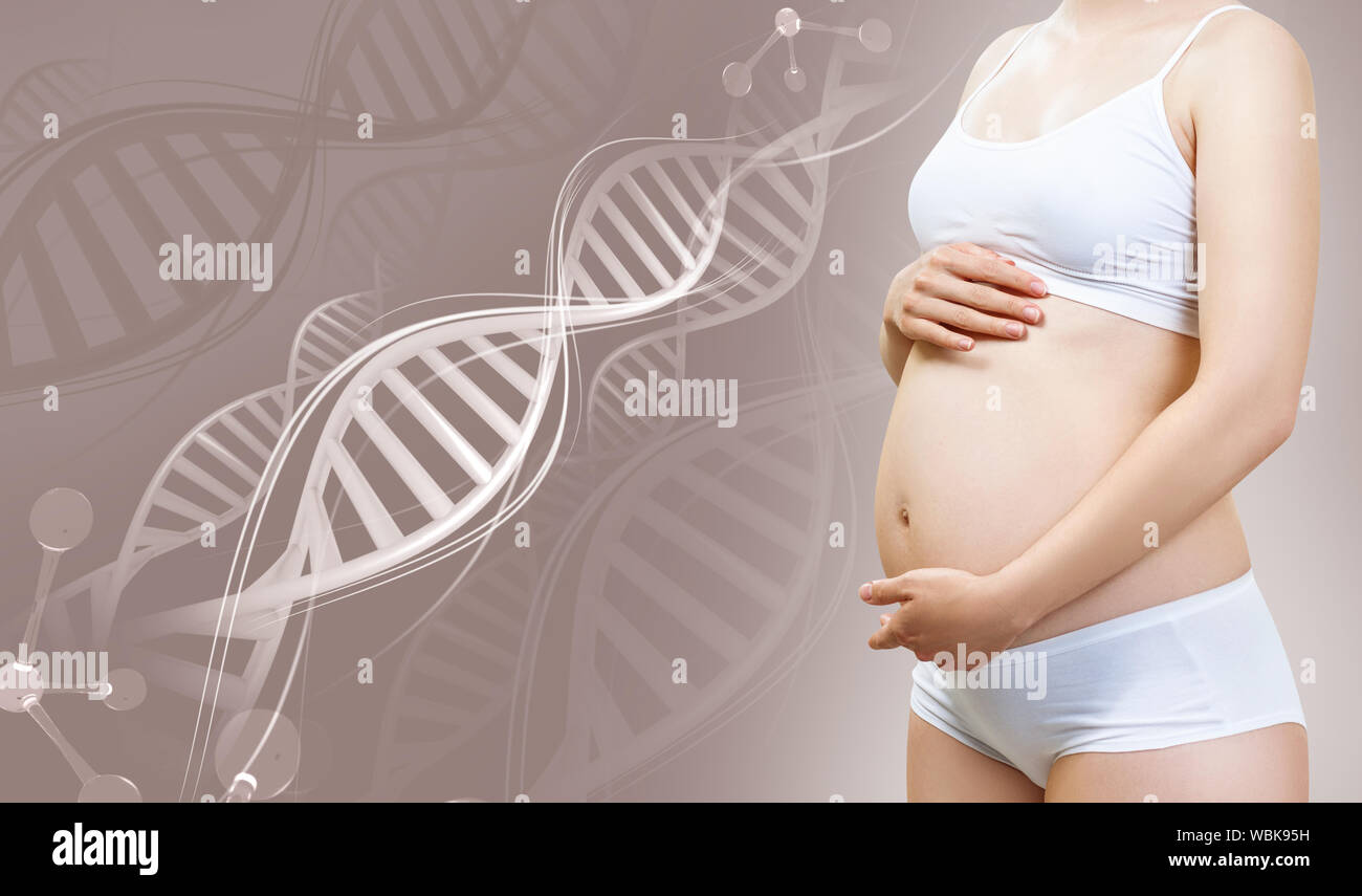 Young pregnant woman among DNA stems. Genetic science concept. Stock Photo