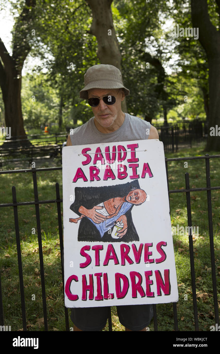 Members of 'The Catholic Workers' and other anti-war activists hold a vigil every Saturday in New York City to raise awareness of the terrible plight of the people of Yemen due to the bombings from Saudi Arabia backed by the US military. Stock Photo